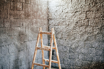 Ladder in a renovating room, interior reconstruction house and home fixes.