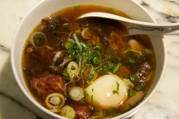 Tokyo ramen noodles with peppery Harissa beef ribs in chicken broth