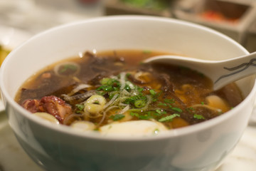 Tokyo ramen noodles with peppery Harissa beef ribs in chicken broth