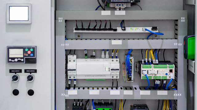 PLC Control panel with wires terminal connection for machine in the factory