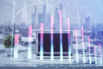 Forex graph hologram on table with computer background. Multi exposure. Concept of financial markets.