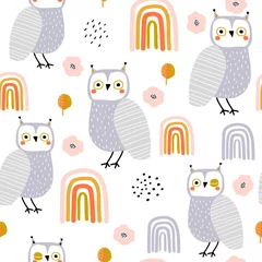 Stof per meter Naadloos patroon met uilen en regenbogen. Creatieve vakantie textuur. Geweldig voor stof, textiel vectorillustratie © solodkayamari