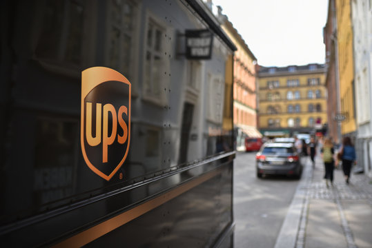 Copenhagen / Denmark - 07.23.19: Truck Of UPS (United Parcel Service) On European Street In Selective Focus