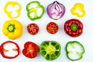 Circled vegetables: tomatoes, bell peppers, purple onions isolated on a white background.