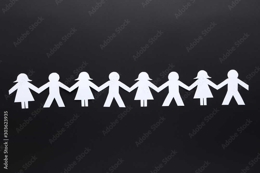 Wall mural paper chain people on black background