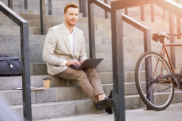 Successful manager with a laptop stock photo