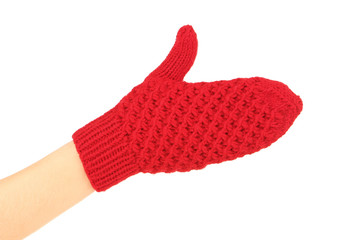 Hand in knitted mitten on white background