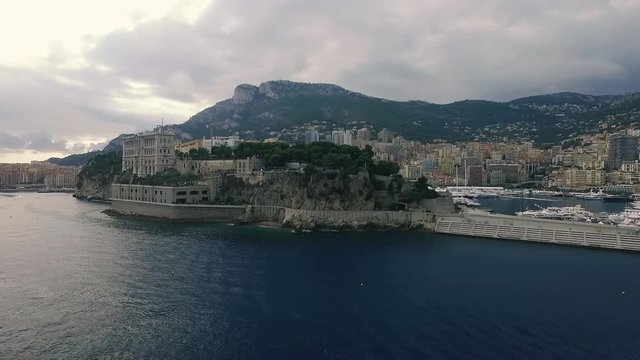 Aerial panoramic view of cityscape of Monte Carlo, yachts in harbor, landscape panorama of Monaco from above, Europe