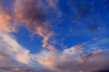 Plakat Blue sky with colorful clouds