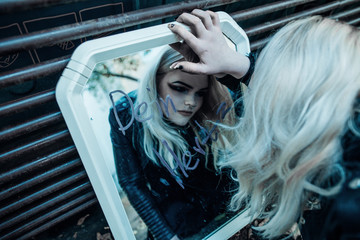 Fototapeta na wymiar Gothic girl with mirror