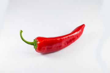 Fresh red pepper, white background
