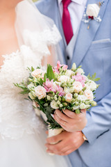 The bride's bouquet with white and pink flowers
