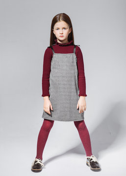 portrait of little model girl in studio