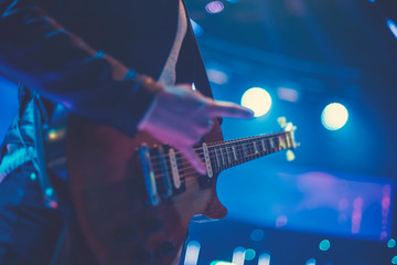 Obraz na płótnie Canvas guitarist at a concert