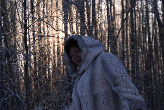 Langepas. Western Siberia. Woman in the forest in winter.