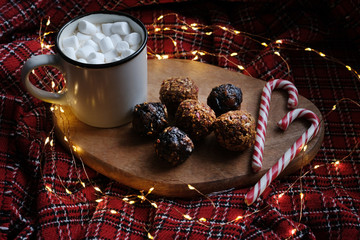 Chrismas marshmellow cocoa with energy balls and candy canes
