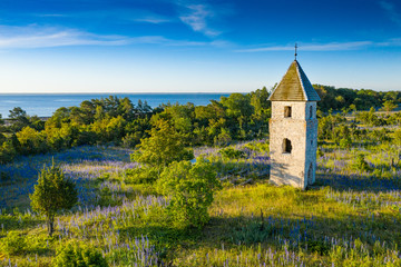 Coastal Swedish Chapel, blue sky and seaside natural environment background. Shore in Pakri Island, Nature Reserve in Estonia, National Park in Europe