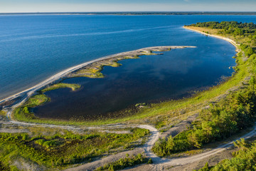 Stone wall on the Baltic sea in the summer. Pakri coast, island in Estonia, Europe.