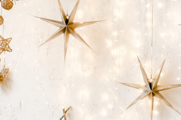 Christmas, New Year magic decor: stars, lights and burning garlands. Traditional winter holidays Christmas / New Year. 