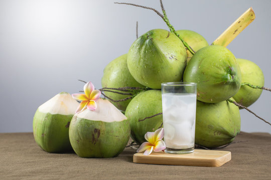 Fresh Organic Coconut Water with coconuts.Drink coconut water. Healthy food concept.
