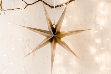 Christmas, New Year magic decor: stars, lights and burning garlands. Traditional winter holidays Christmas / New Year. 