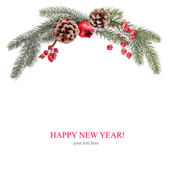 Christmas frame made of fir branches and red berries.   Christmas wallpaper. Flat lay, top view. Copy space.