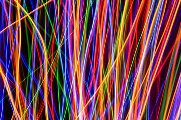 Colorful lights on the long exposure with motion background, Abstract glowing colorful lines, slow speed shutter.