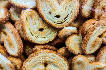 Cookies with sugar crumbs close-up. Background, texture. View from above. Place for text