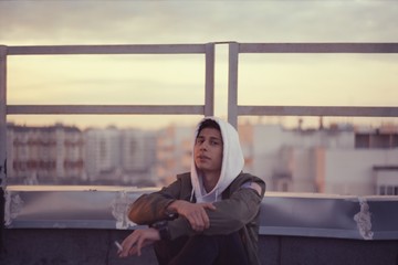 young man sitting on sofa