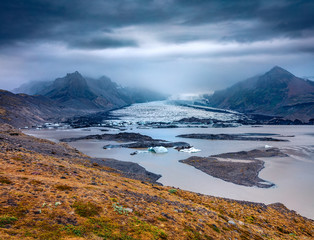 Melting ice from Vatnajokull glacier. Dramatic summer scene of Vatnajokull National Park, Iceland, Europe. Beauty of nature concept background.