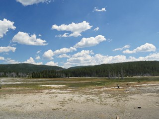 View from the Firehole Lake Drive, with stunning clouds in the skies at Yellowstone National Park, Wyoming.