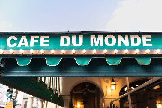 New Orleans, USA - April 23, 2018: Cafe Du Monde sign closeup for famous restaurant serving beignet donuts
