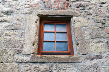 Wooden window at wall of medieval fortress called 'Burg Steinsberg' in city Sinsheim