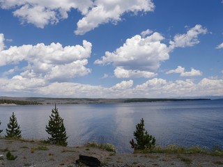 Yellowstone Lake on a beautiful day with gorgeous clouds at Yellowstone National Park, Wyoming, USA.