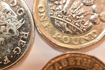 UK 1 pound coins in close up