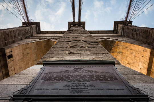 Looking up at a bridge