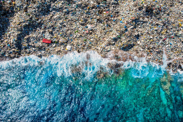 Concept environmental pollution ocean and water with plastic and human waste. Aerial top view