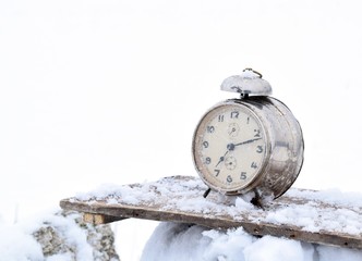 old alarm clock on white background