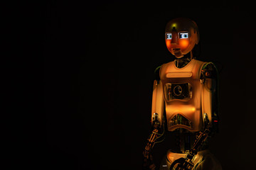 Robot man in the dark. Future concept