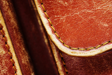 Detail of an old leather bag briefcase close up