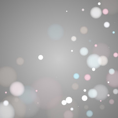 Pink blue white abstract snowflakes over gray background.