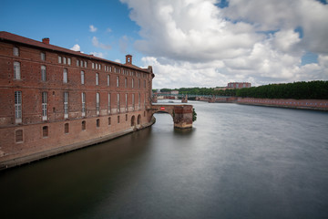 The amazing view of Toulouse's river with it's famous bridge and iconic  dome of the 'Hopital de la Grave'