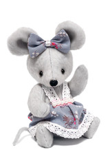 Cute gray plush toy mouse in a dress isolated on white background