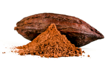 Cocoa pod and heap of cacao powder isolated on a white background.