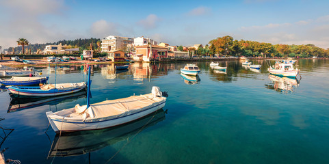 Fototapeta na wymiar Bright panoramic view of old Kerkira port, capital of Corfu island, Greece, Europe. Sunny summer seascape of Ionian sea. Traveling concept background.