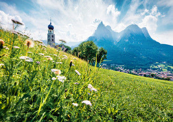 Splendid morning view of San Valentino Church in Castelrotto/Kastelruth village. Colorful summer...