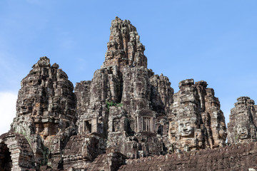 Fototapeta na wymiar Bayon Temple, Siem Reap, Cambodia. This temple is famous for its variety of different Buddah faces. They are in pristine condition and rank among the most popular temples.