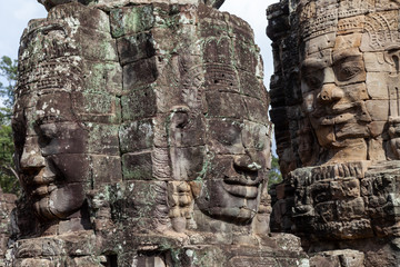 Fototapeta na wymiar Faces of Bayon Temple, Siem Reap, Cambodia. This temple is famous for its variety of different Buddah faces. They are in pristine condition and rank among the most popular temples.