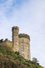 Old tower on Calton Hill in Edinburgh, Scotland - 303688122
