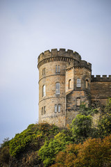 Fototapeta na wymiar Old tower on Calton Hill in Edinburgh, Scotland